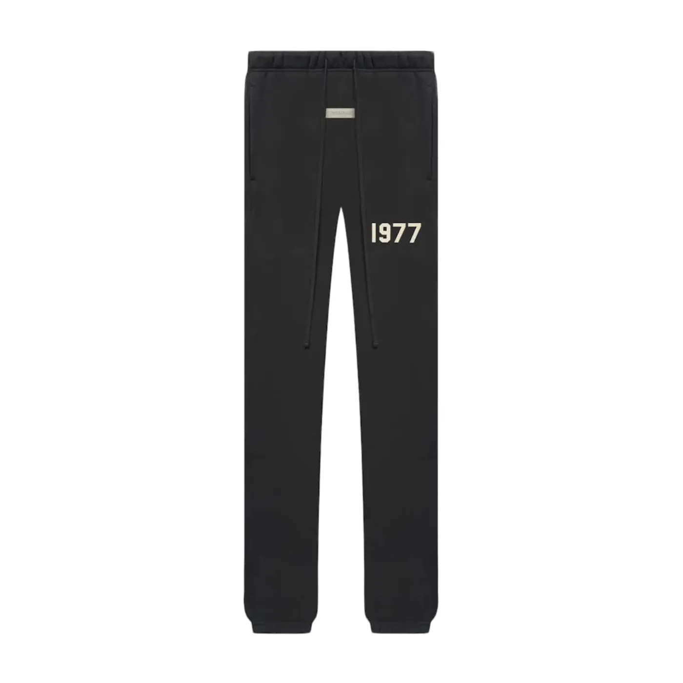 Fear of God Essentials 1977 Iron Black Full set black sweatpants featuring an elastic waistband, drawstrings, and "1977" print, part of exclusive sneakers and clothing collection.