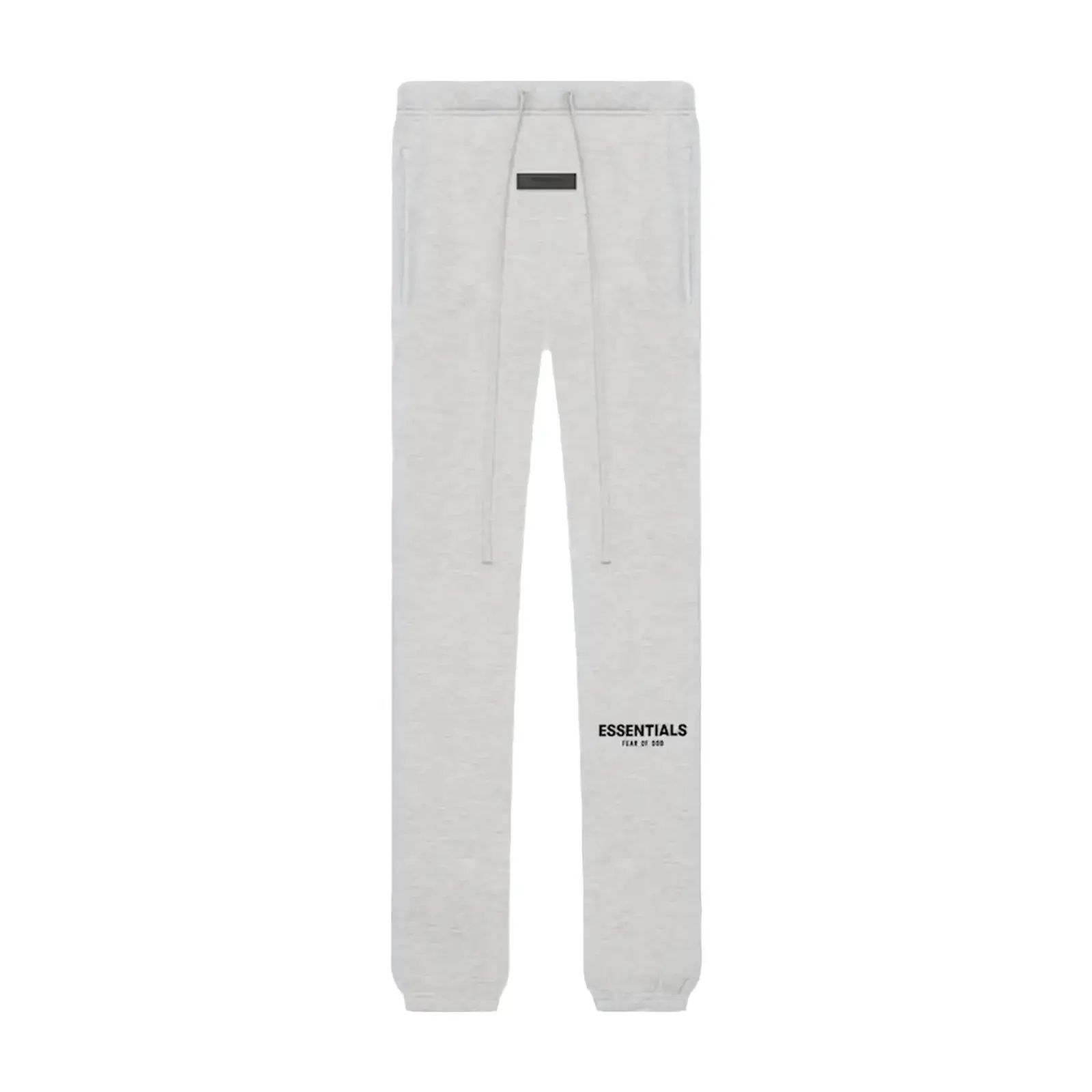 Light oatmeal sweatpants with drawstring waist and elastic cuffs, featuring a subtle "ESSENTIALS" logo, part of the Fear of God Essentials Light Oatmeal Full set, perfect for casual stylish clothing.